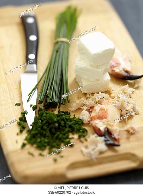 Preparing the Fromage frais with chives and crab meat
