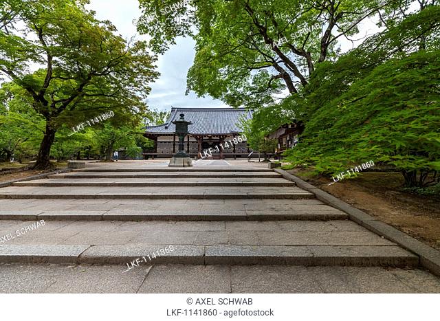 Stone stairs and bronze lantern at temple Ninna-ji, Kyoto, Japan
