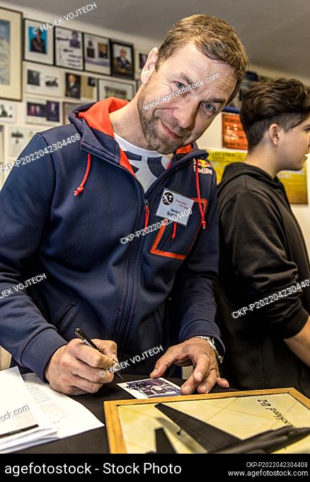 Aerobatic pilot, the World Champion in the 2018, Martin Sonka gives autographs as attended the opening of exhibition of U.S