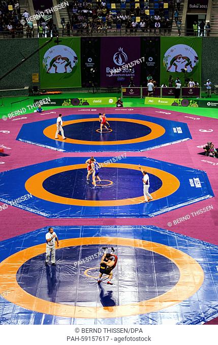 Wrestlers compete in the men's Greco-Roman wrestling in the Heydar Aliyev Arena Baku, Azerbaijan, 13 June 2015. The 2015 European Games will be held in...