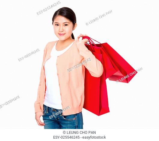 Young woman hand hold with shopping bag