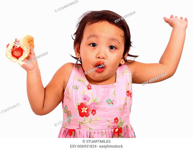 Small Girl Looking Shocked And Surprised After Biting Her Too Hot Hotdog