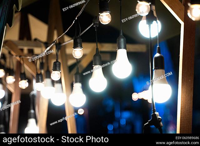 Decorative outdoor string lights in the evening