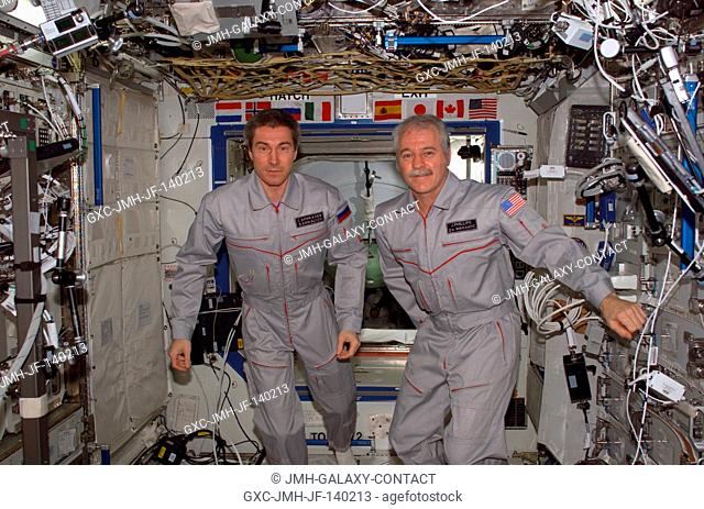 Cosmonaut Sergei K. Krikalev (left), Expedition 11 commander representing Russia's Federal Space Agency, and astronaut John L