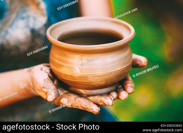 Pottery Craft Ceramic Clay In Potter Human Child Hands