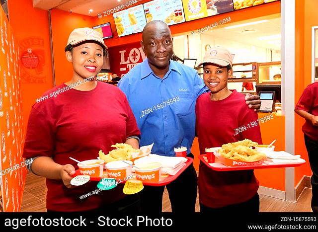 Johannesburg, South Africa - July 06 2017: Staff at a Popeyes Take Out Fast Food Restaurant