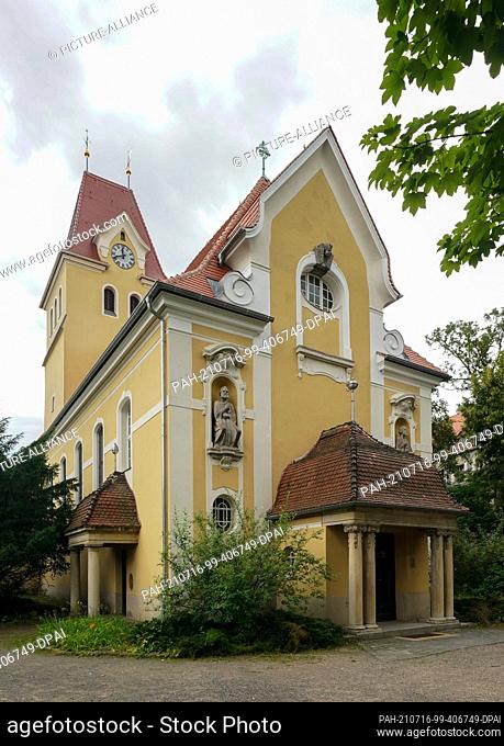 13 July 2021, Saxony, Leipzig: The exterior view of the Evangelical Lutheran Church of the Apostles. The church in the southwest of Leipzig was originally...