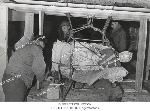 Soldiers of U.S. Army MFAA Section transporting Michelangelo's 'The Bruges Madonna'. 'Monuments Men' Stephen Kovalyak, George Stout and Thomas Carr Howe