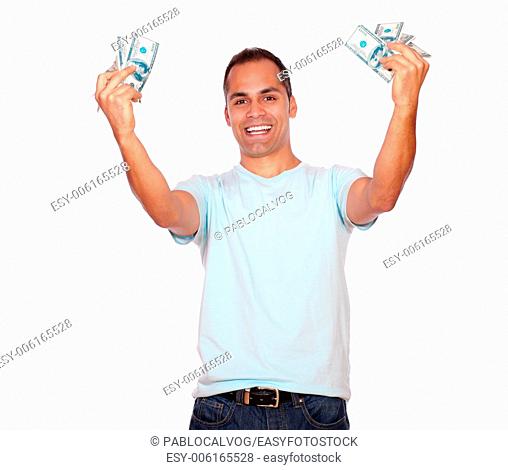 Portrait of an excited adult man with cash money against white background