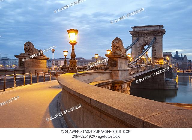 Dawn at the Chain Bridge across Danube river in Budapest, Hungary
