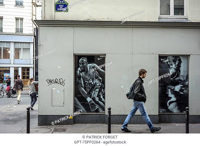 STREET SCENE IN FRONT OF A SPORTS ARTICLES STORE, RUE DE CHARENTON, 12TH ARRONDISSEMENT, PARIS, FRANCE