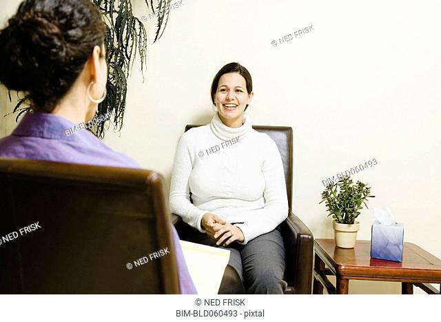 Hispanic woman at therapy session