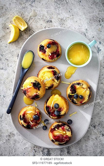 Berry muffins filled with lemon curd