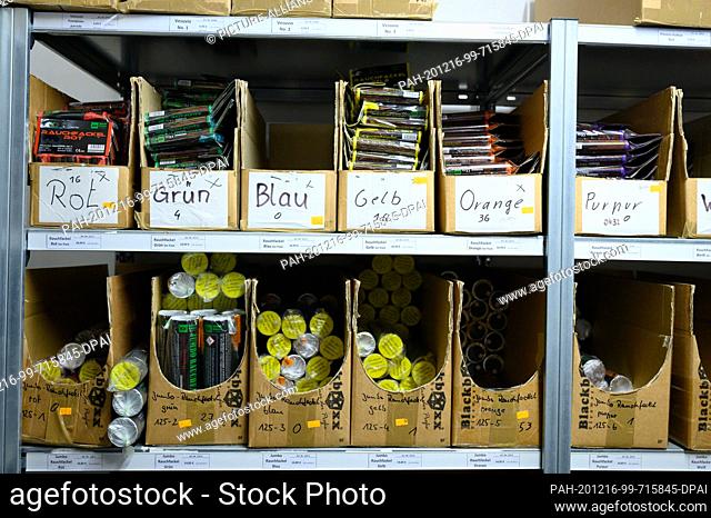 16 December 2020, Saxony, Marienberg: Pyrotechnics lie on a shelf in a Blackboxx Fireworks GmbH warehouse. The sales ban on New Year's Eve fireworks due to the...