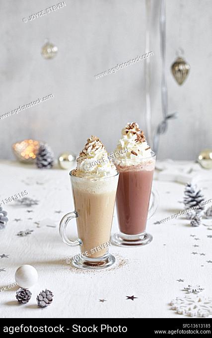Festive latte and a hot chocolate with whipped cream on top