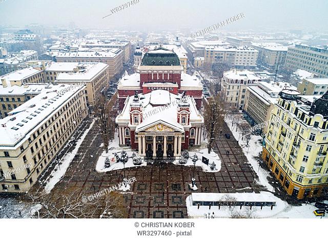 Aerial view of Ivan Vazov National Theatre in a snow storm, Sofia, Bulgaria, Europe