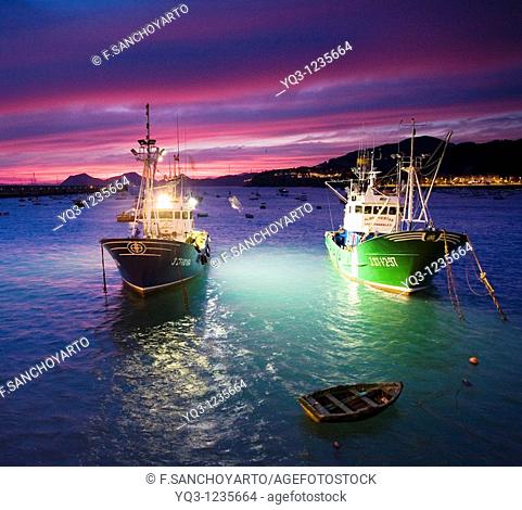 Fishing boats at dawn. Port of Castro Urdiales, Cantabria, Spain