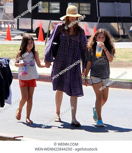 Adam Sandler wearing a large straw hat goes out and about in Malibu with his wife and daughters Featuring: Jackie Sandler, Sadie Madison Sandler