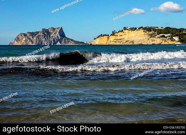 A beautiful view from the coastal town of Moraira, looking towards Calpe Rock and the town of Calpe in the Costa Blanca region of Spain