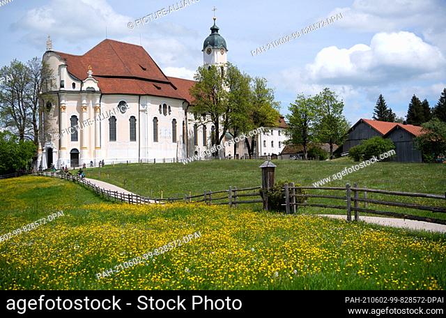 28 May 2021, Bavaria, Steingaden: The pilgrimage church of the Flagellated Saviour on the Wies, usually called the Wieskirche for short