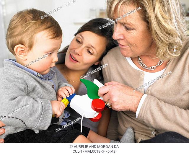 grandmother, mother and baby boy
