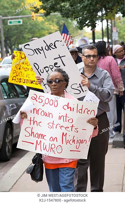 Detroit, Michigan - People protest the state of Michigan's decision to drop more than 12, 000 families from the welfare rolls  The state legislature passed a...