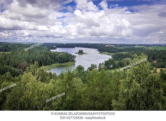 Aerial view of Jedzelewo Lake from lookout tower in Stare Juchy village in Warmian-Masurian Voivodeship of Poland