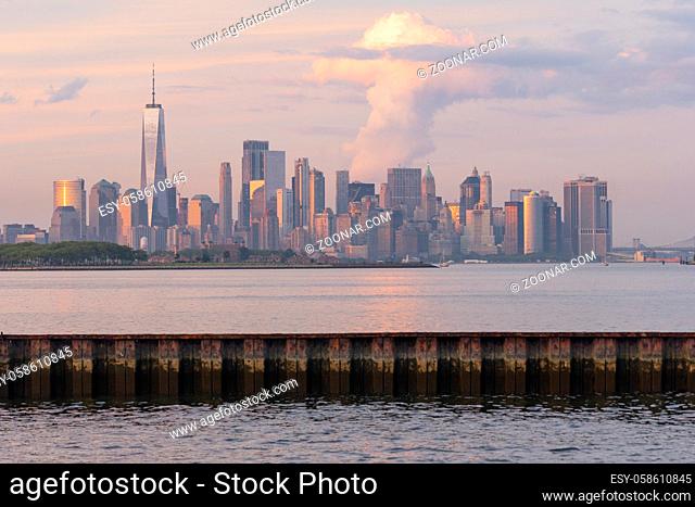 Manhattan is one of 5 Burroughs that make up New York City shown here at sunset