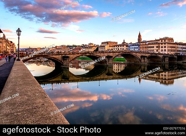 FLORENCE, TUSCANY/ITALY - OCTOBER 19 : View of buildings along the River Arno in Florence on October 19, 2019. Unidentified people
