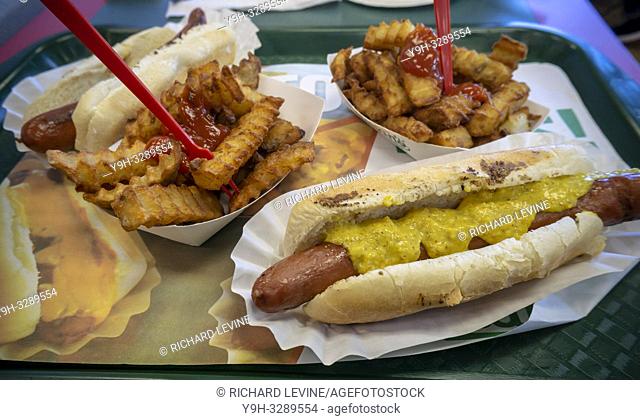 An order of hot dogs and fries in the stand-alone Nathan's Famous location in the Bay Ridge neighborhood of Brooklyn in New York on its last day, Sunday