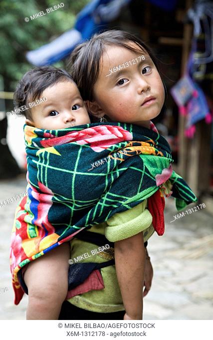 little girl and brother in Cat Cat village  Sapa, Lao Cai province, Vietnam