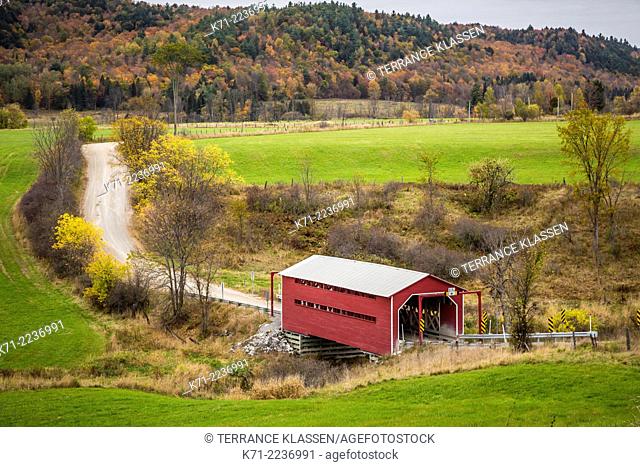 The Chelsea covered bridge spans Meech Creek southwest of Farm Point in Gatineau Park, Quebec, Canada