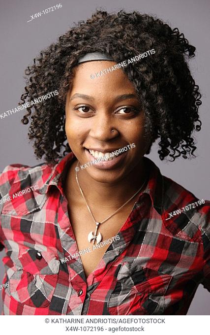 Young African-American woman posing for portrait