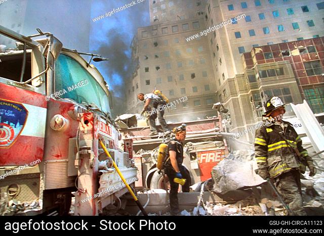 New York City fire fighters amid debris following September 11th terrorist attack on World Trade Center, New York City, New York, USA, Unidentified Artist