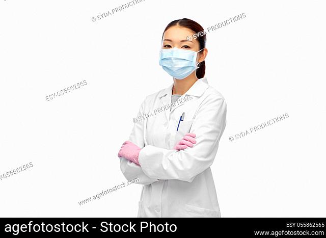 asian female doctor or scientist in medical mask