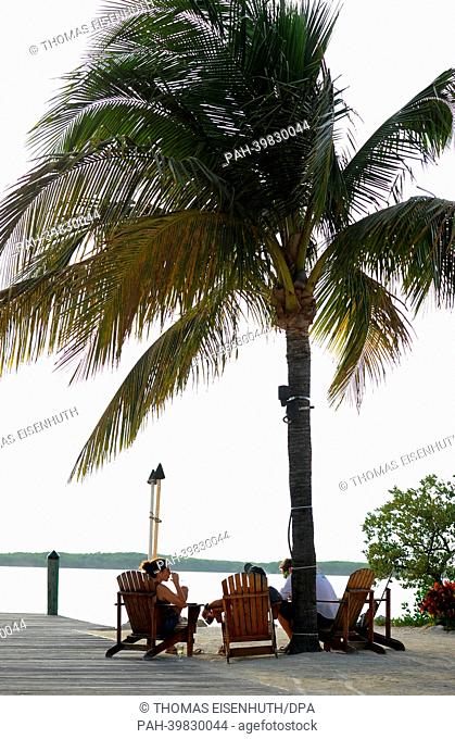Tourists relax at a beach esplanade at Florida Keys in Islamorada, Florida, USA, 26 May 2013.Photo: Thomas Eisenhuth | usage worldwide