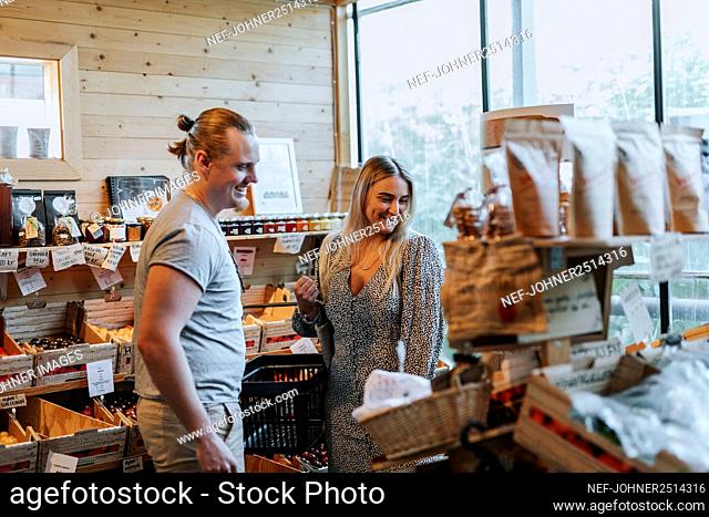 Smiling couple in eco shop