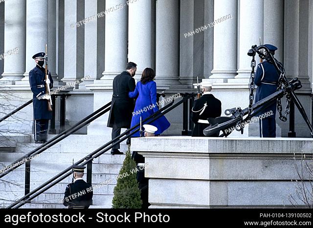 Vice President Kamala Harris and Second Gentleman Doug Emhoff walk to the Eisenhower Executive Office Building in Washington, D.C., U.S