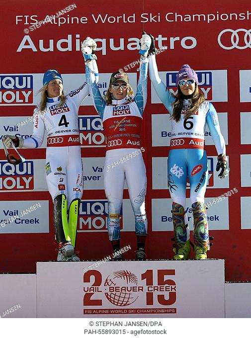 (L-R) Silver medal winner Frida Hansdotter of Sweden, gold medal winner Mikaela Shiffrin of USA and bronze medal winner Sarka Strachova of Czech Republic react...