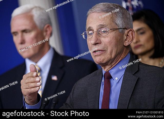 Director of the National Institute of Allergy and Infectious Diseases Dr. Anthony Fauci, with Vice President Mike Pence (L) and Surgeon General of the United...