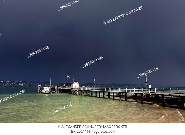 Boat pier on Lake Constance with storm clouds, Dingelsdorf, Konstanz district, Baden-Wuerttemberg, Germany, Europe, PublicGround