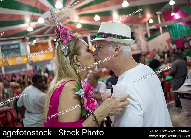 21 February 2020, Brazil, Rio de Janeiro: A couple kissing during a rehearsal at the samba school ""Estacao Primeira de Mangueira""