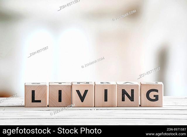 Cubes with the word living on an indoor table