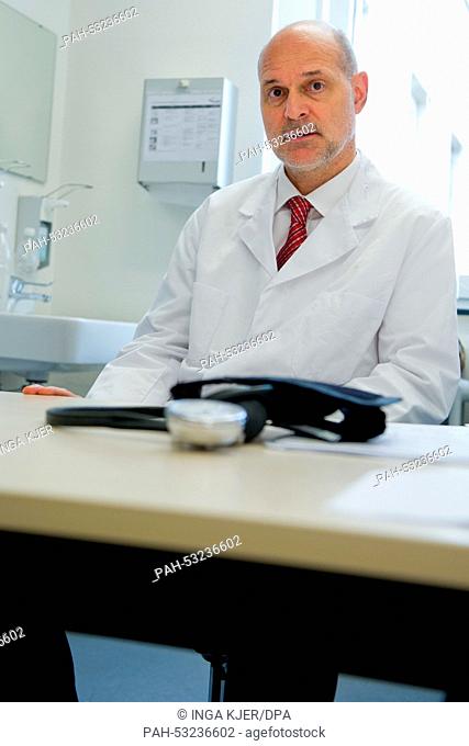 Peter Kremsner, director of the institute for tropical medicine at the university of Tuebingen, sits in his consulting room in Tuebingen, Germany