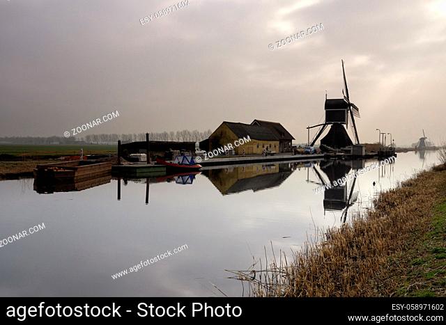 The Graaflandse windmill on the Ammerse Boezem canal near Groot-Ammers in the Dutch region Alblasserwaard