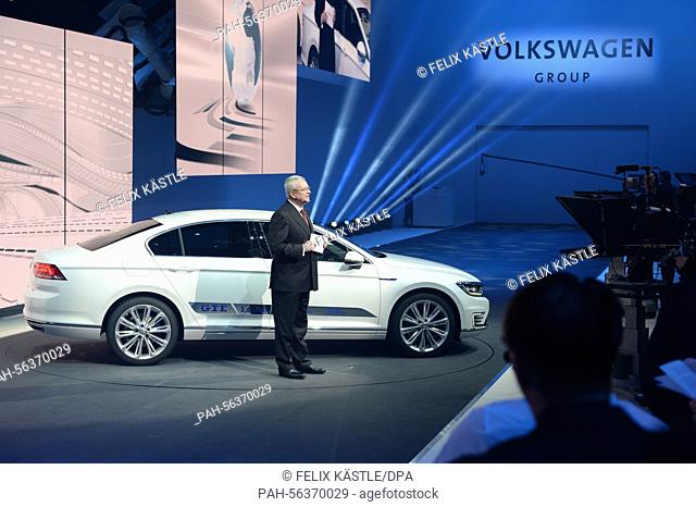 Martin Winterkorn, executive board member of the VW Group, presents the new prototype of the VW Passat during the VW Group Night in the Espace Secheron Hall one...