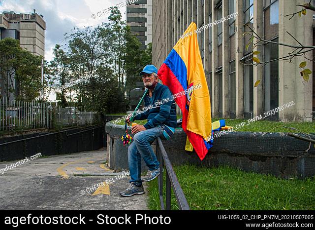 An elderly men participates in demostrations with a Colombian flag in Bogota, Colombia on May 7 2021 after peaceful demonstrators against the tax and health...