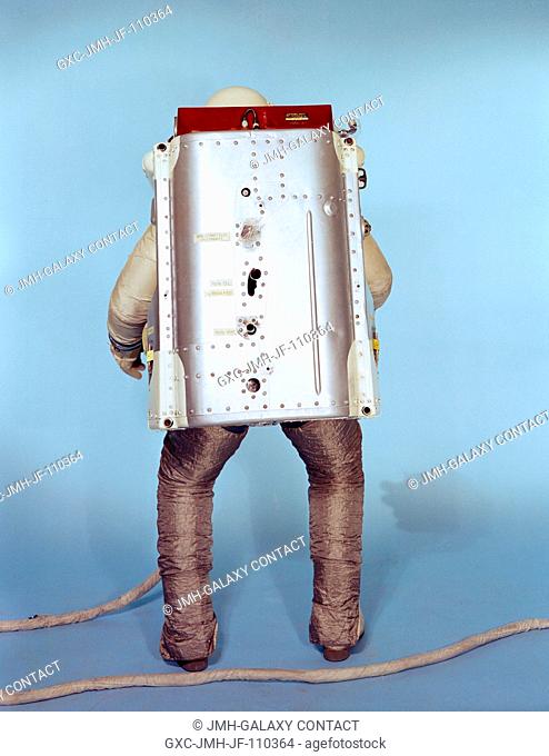 Rear view of the Astronaut Maneuvering Unit (AMU), worn by test subject Fred Spross, Crew Systems Division. The Gemini spacesuit