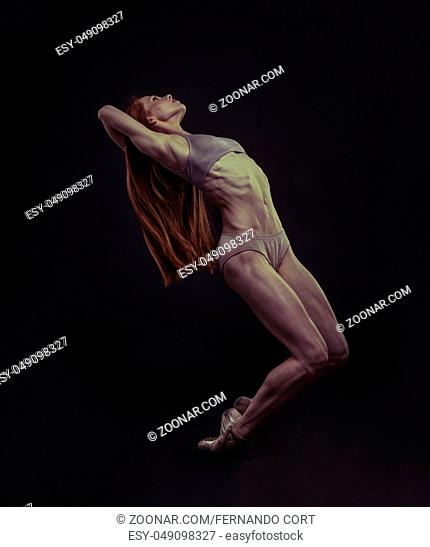 Ballerina, elegance and beauty of a ballet dancer model with great musculature and beautiful body