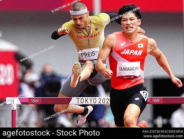 30 July 2021, Japan, Tokio: Athletics: Olympics, 400 m hurdles, men, heats at the Olympic Stadium. Constantin Preis (l) from Germany in action